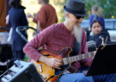 Friends of Rose Park - Farmers Market - Musician playing guitar