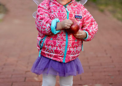 Friends of Rose Park - Halloween 2018 - child with fairie wings holding apple