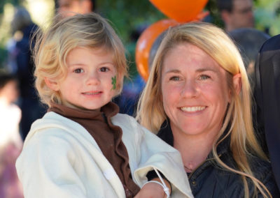 Friends of Rose Park - Halloween 2018 - woman holding a child, smiling